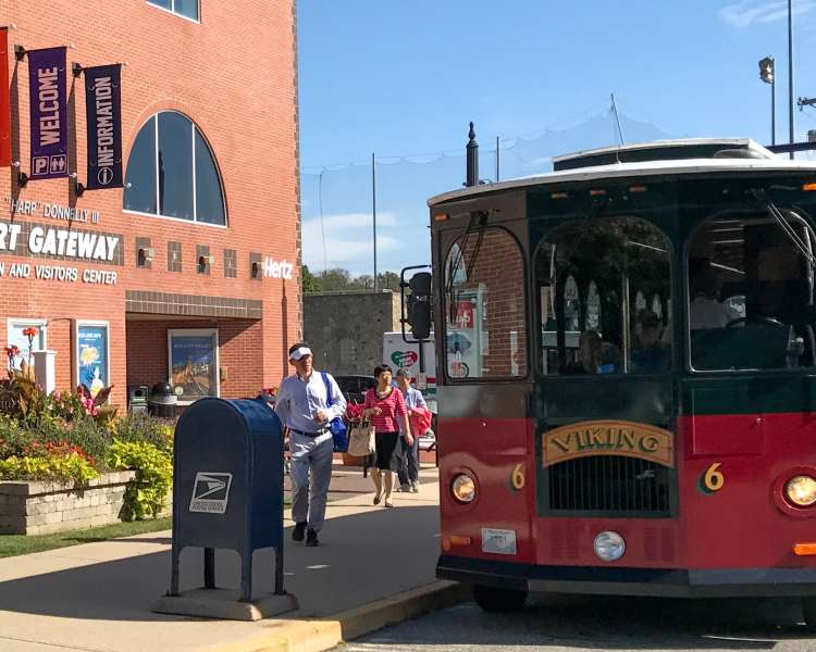 Trolley tour bus in front of Newport Gateway Center