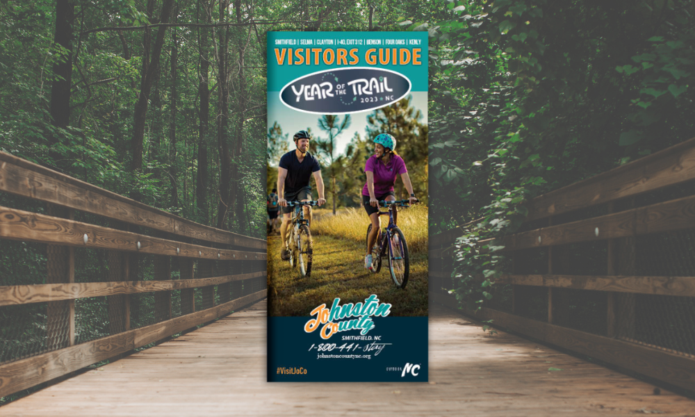 Visitors guide cover on Clayton greenway photo.