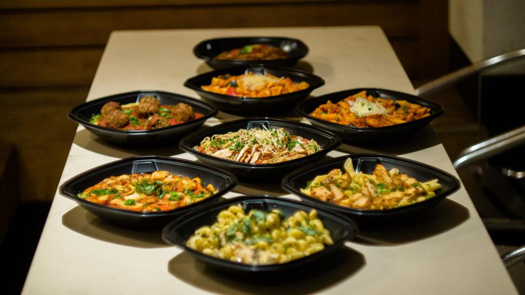 Photo of to-go bowls of pasta from Pasta Masta