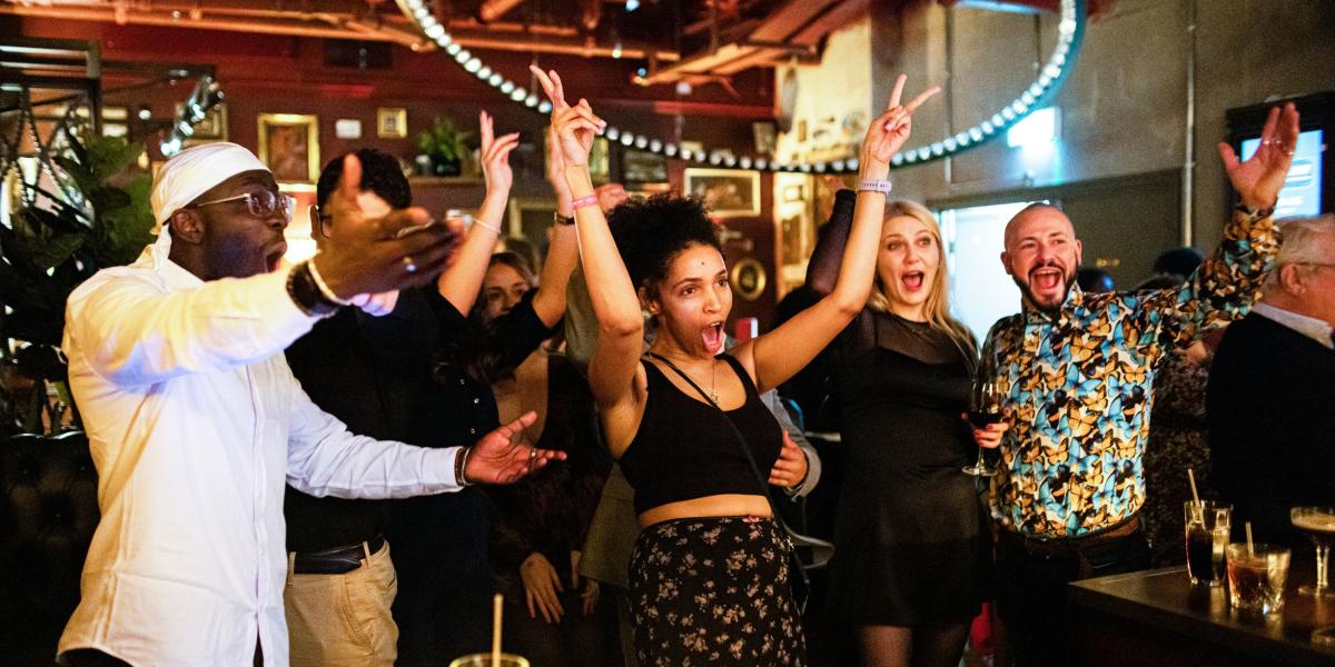 Group of people celebrating - credit Flight Club