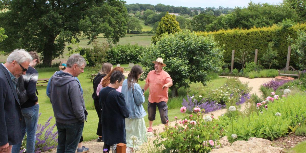 People inthe garden at The Pony Chew Valley in North Somerset near Bristol - credit Visit West