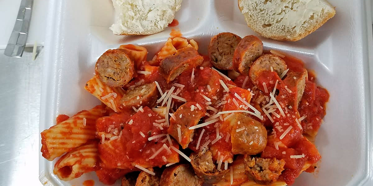 Close up of pasta with sausage and cheese from Papa Lombardi's Italian Smokehouse food truck in Casper, WY