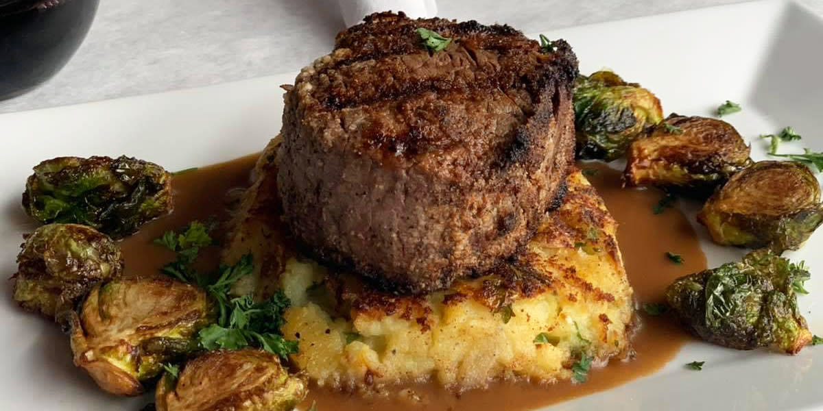 Close-up of steak and Brussels sprouts at Rib and Chop House in Casper, WY