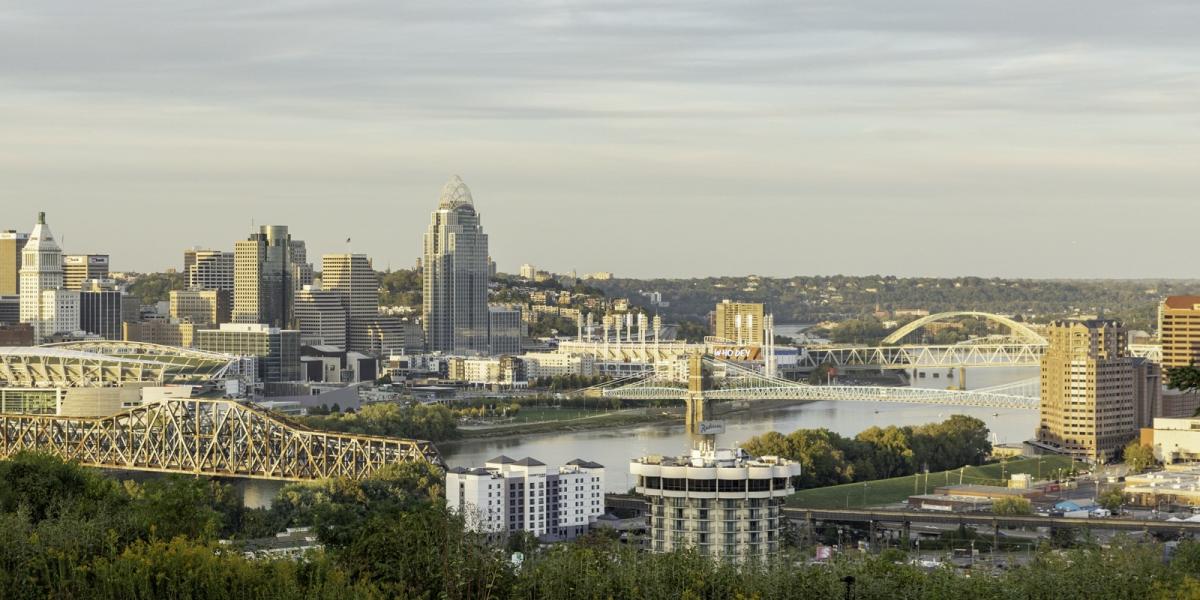 Image is of the view of Covington and Downtown Cincinnati with the bridges connecting them.