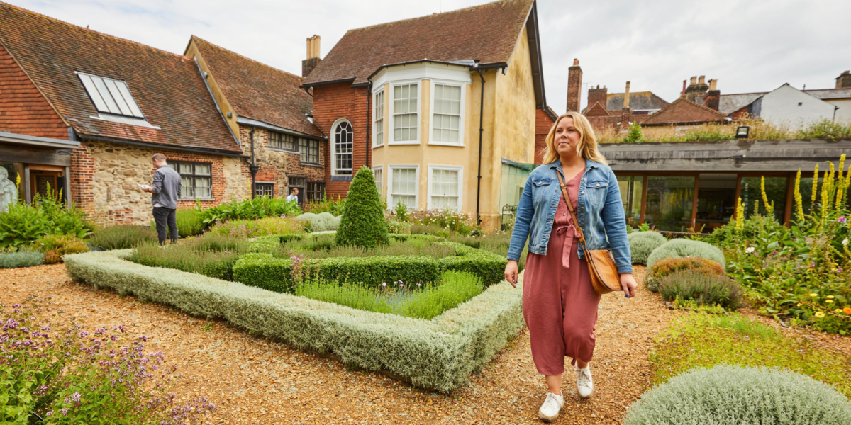 Women walking in the tudor house garden
