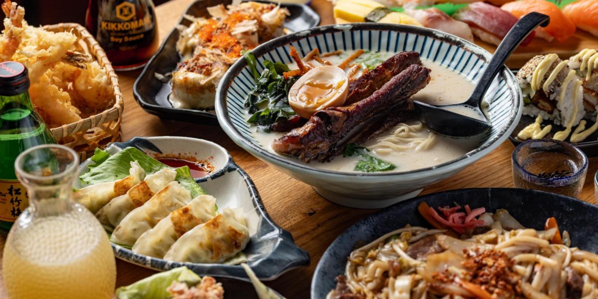 Spread of Japanese dishes such as ramen, tempura and dumplings at Sakura