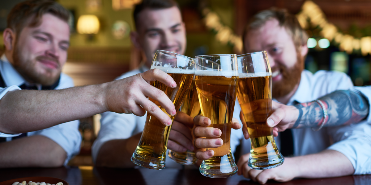 Guys Cheersing with Beer