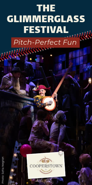An image of a man in costume playing a lute on state with the test above that says The Glimmerglass Festival, Pitch-Perfect Fun.