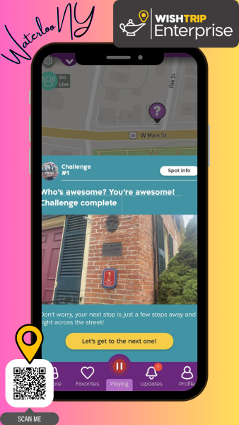 Wishtrip app pulled up on an image of a phone in front of a pink and yellow background.