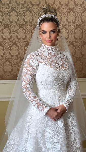 A beautiful Jamaican bride with an elaborate updo and tiara veil