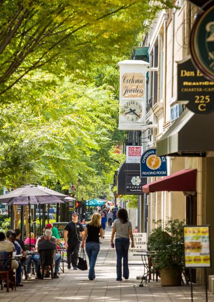 Outdoor dining and shopping on Main Street in downtown Greenville.