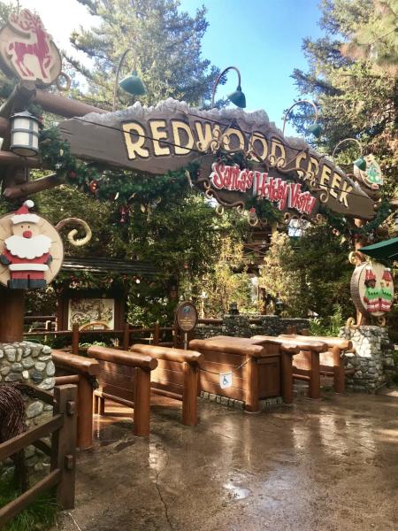 Image of a sign reading "Redwood Creek, Santa Holiday Visit!"
