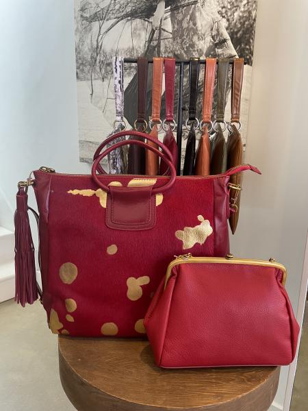 Hobo Annapolis red holiday purses on display