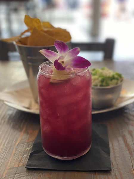 Purple Drank with orchid courtesy of Vida Taco Bar