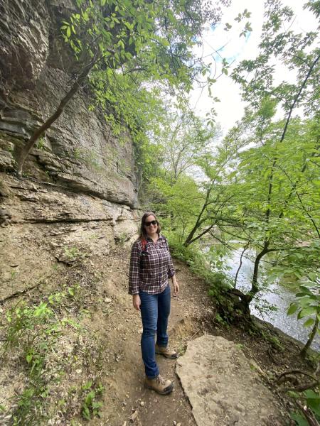 Woman posing on the Big Rock Cherokee Park trail.