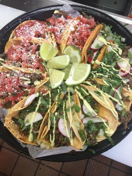 tray of tacos with limes in the middle of a circle from lita's tacos in florence kentucky