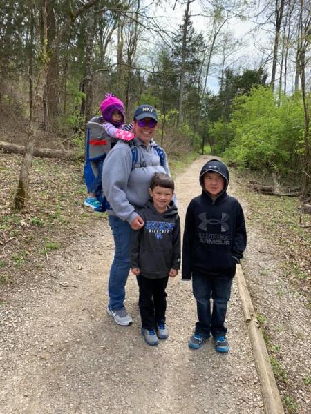 mother with three kids hiking at big bone lick state historic site