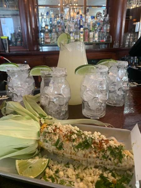 grilled corn at agave and rye in covington ky with pitcher of margaritas in background