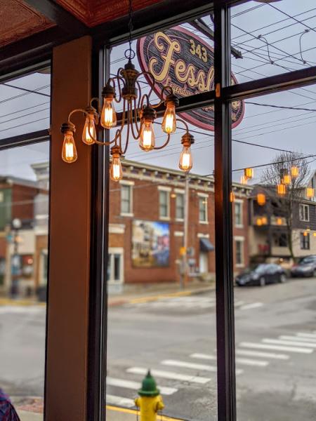 A sign that says Fessler's hanging outside Fessler's restaurant in Bellevue, Kentucky