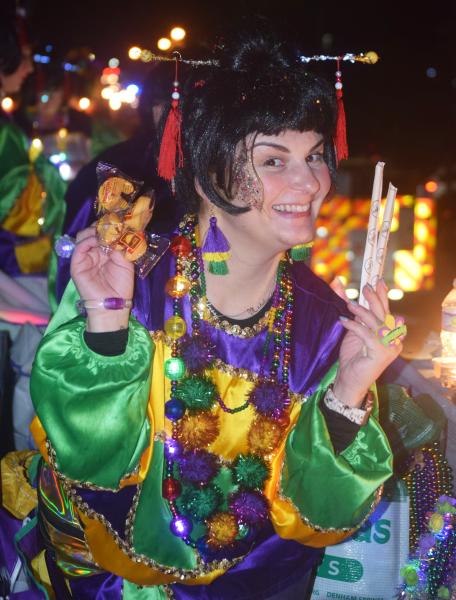 Brightly costumed rider in the Krewe of Titans parade