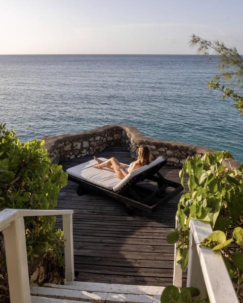 Woman on recliner at Jamaica Inn Spa - Nick and Madison