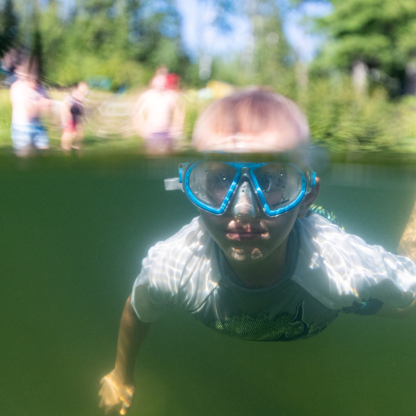 Image of kid snorkeling in a Minnesota lake.