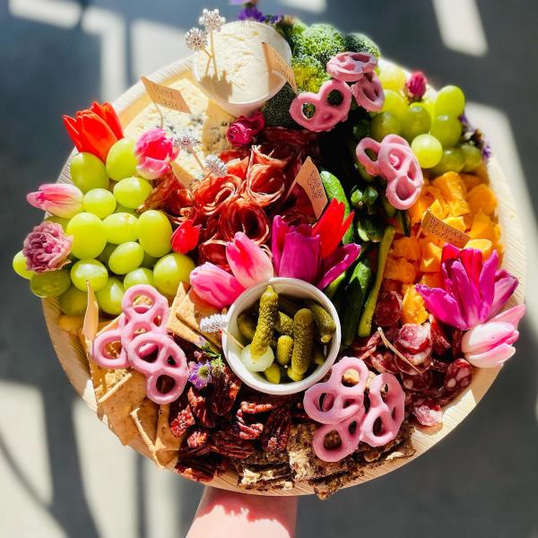 Bountiful Boards cheese board with flowers