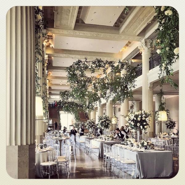 Banquet Hall with Columns and flowers at the Corinthian Houston