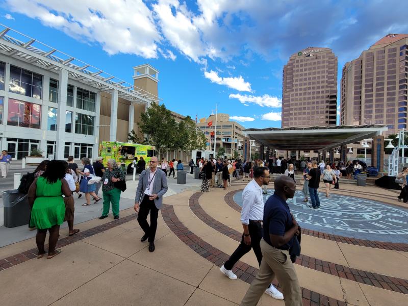 Attendees of the NAPSA conference wander around Civic Plaza.