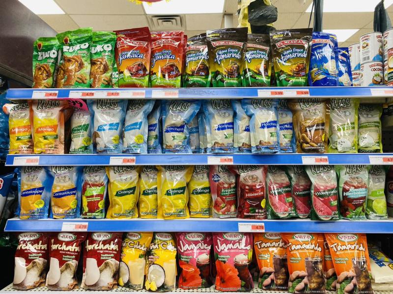 A shelf of goods at El Mezquite Market