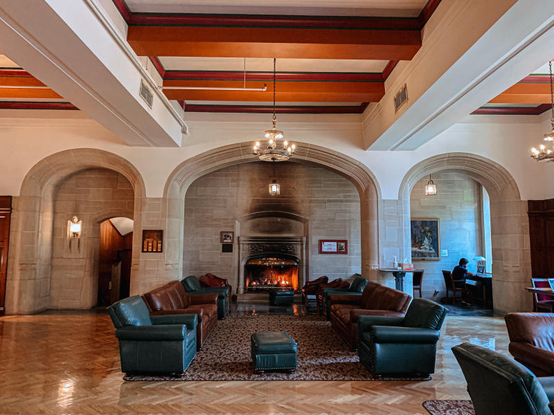A view of the fireplace and leather seating in the Indiana Memorial Union's South Lounge