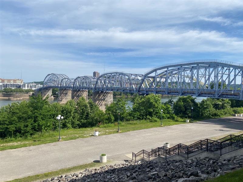 Image is of the Purple People Bridge during the day with the Ohio River below it.