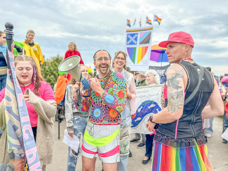 A group of individuals celebrating pride in Grand Marais