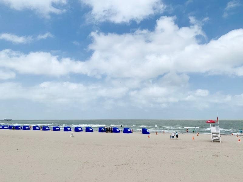 Waters Edge McGee Beach with tents.jpg