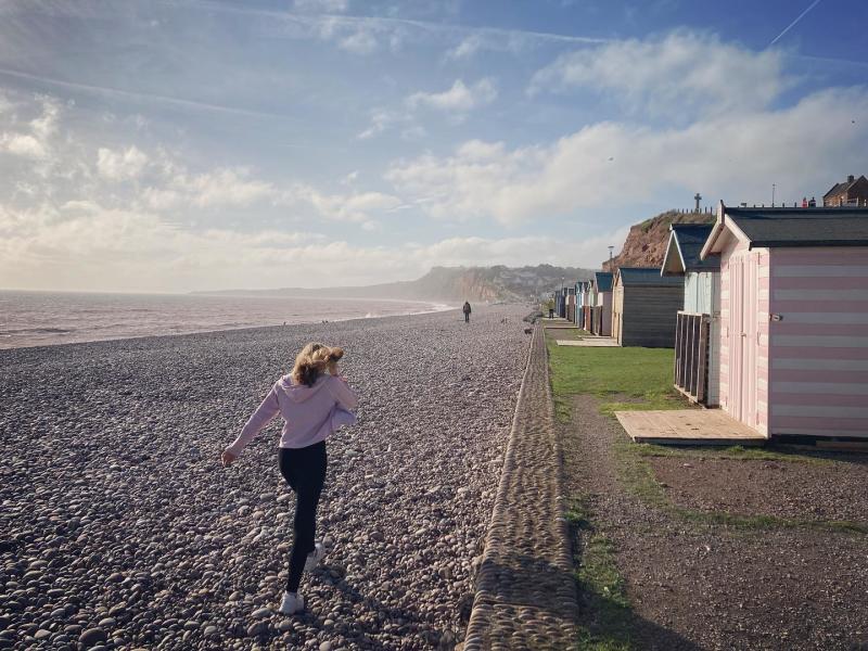 running along budleigh beach