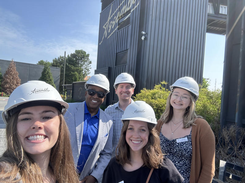 Assembly Atlanta Tour Group in hard hats