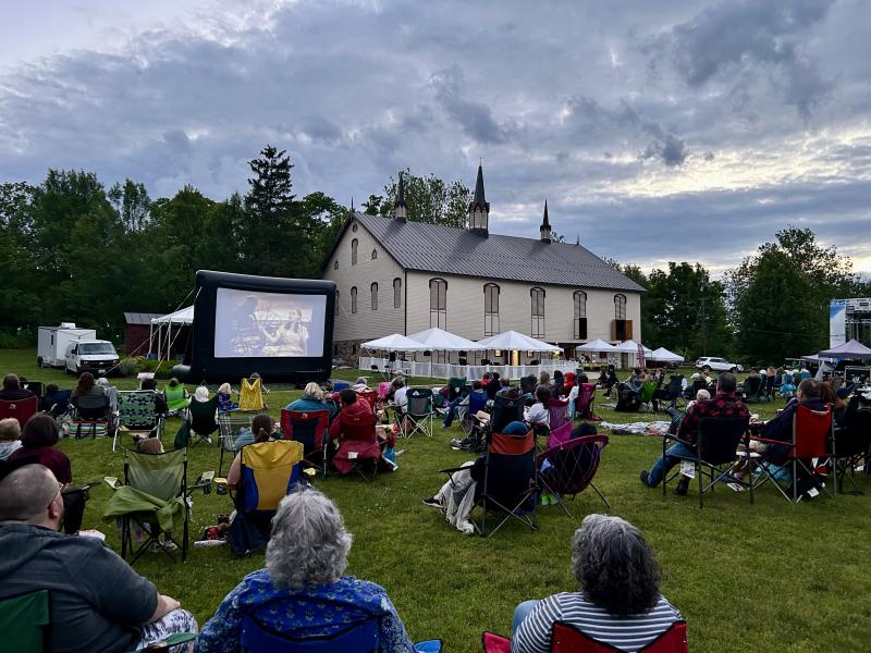 People watching a movie outdoors at the park at Fort Hunter in Harrisburg, PA