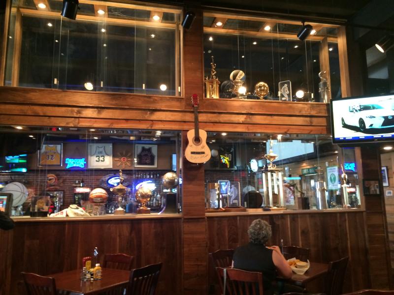 Trophy cases and guitar in 33 Brick Street restaurant in French Lick
