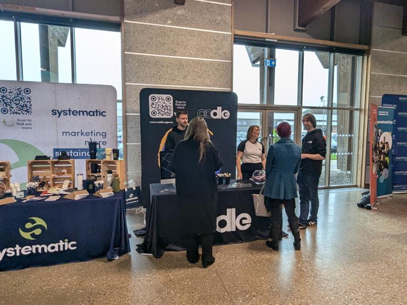 A stall for Systematic in an exhibition hall