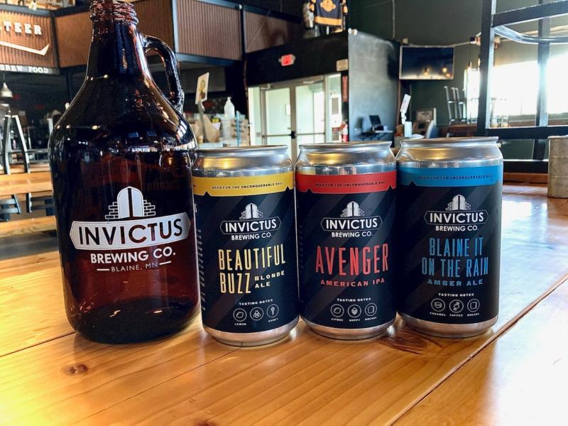 Beer growler and cans at Invictus Brewing Co.