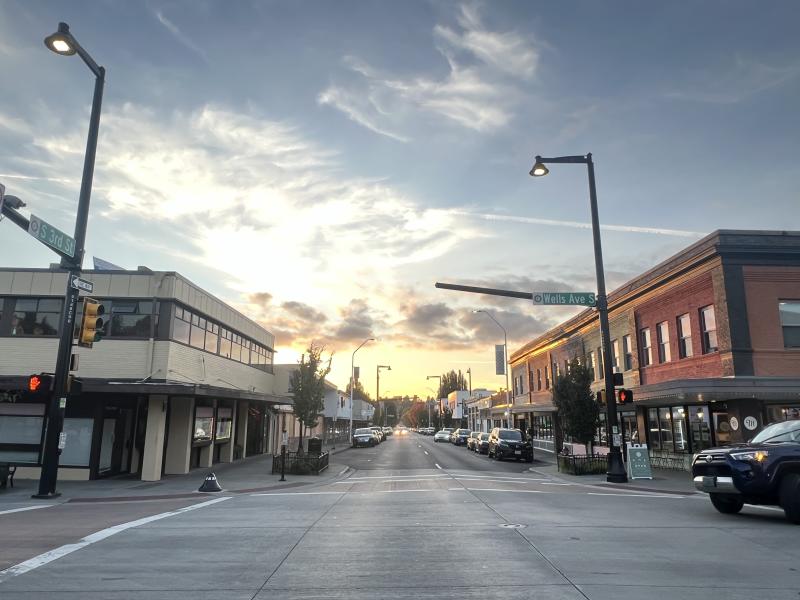 Storefronts and pedestrians along a shopping street in downtown Renton