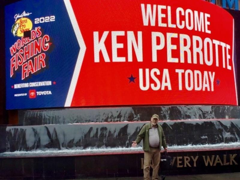 Ken Perrotte in front of Wonders of Wildlife Welcome