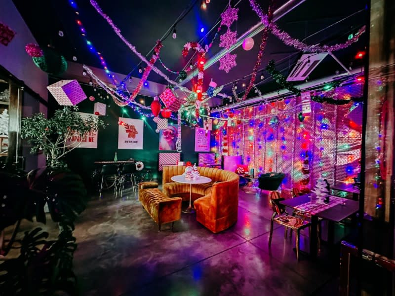 The lounge inside GROW Plant Bar is decked out in holiday decor