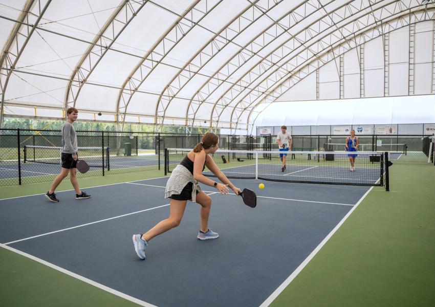 People playing pickleball