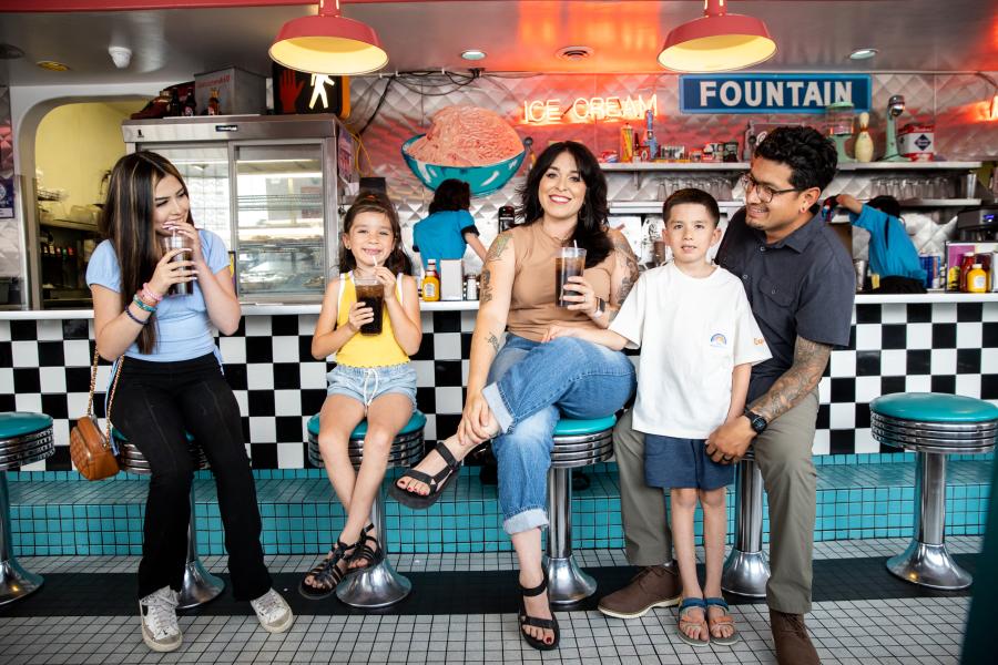 A family sips on drinks inside Route 66 Diner