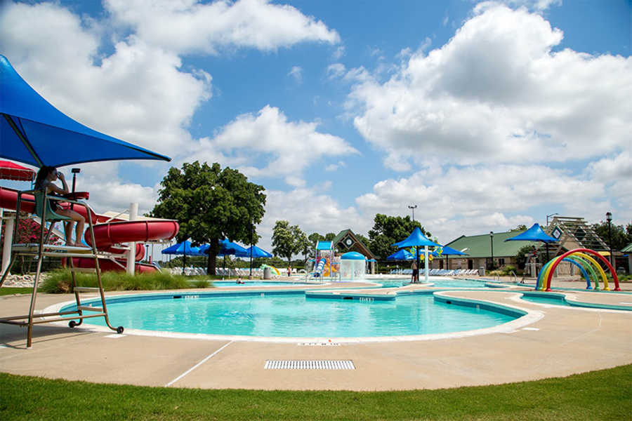 Wide shot photo of Randol Mill Family Aquatic Center with pool