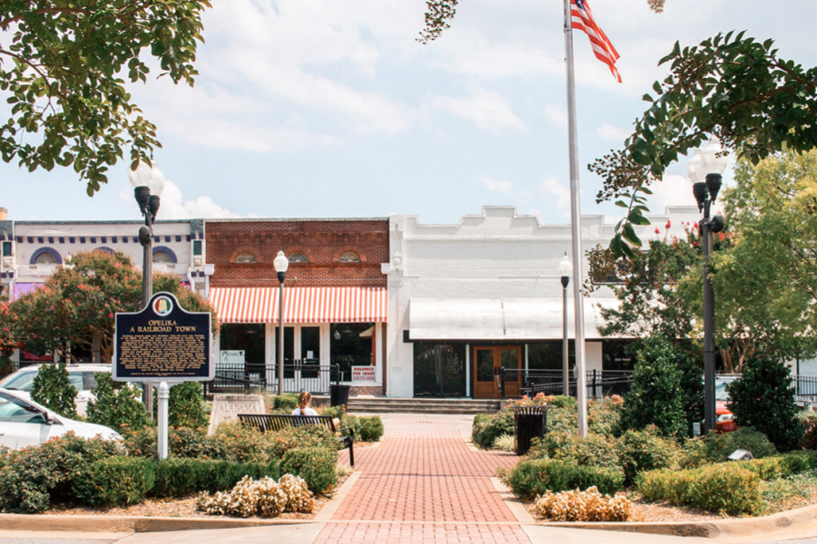 historical market in front of storefronts in Downtown Opelika
