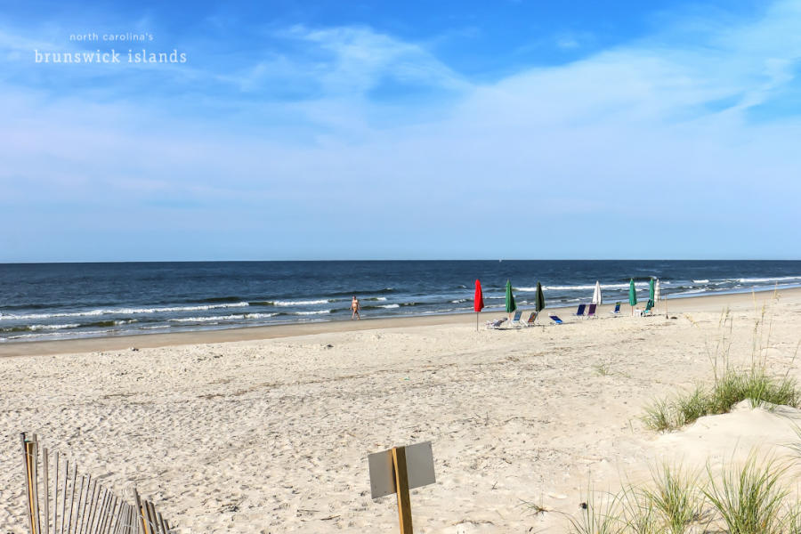 Ocean Isle Beach, NC, view towards ocean, beach chairs and umbrellas on beach