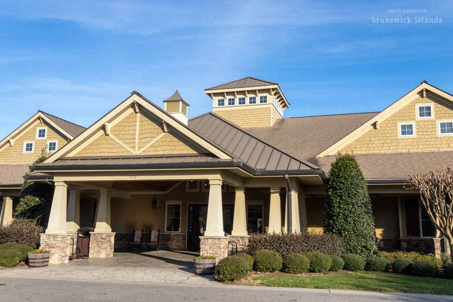a brown golf clubhouse