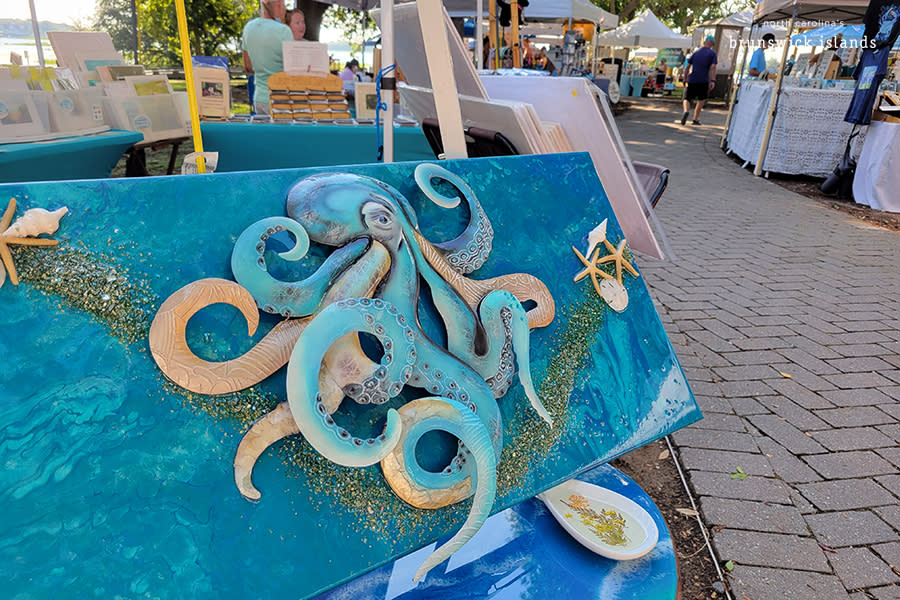 an acrylic octopus painting on sale at the Sunset Beach summer market